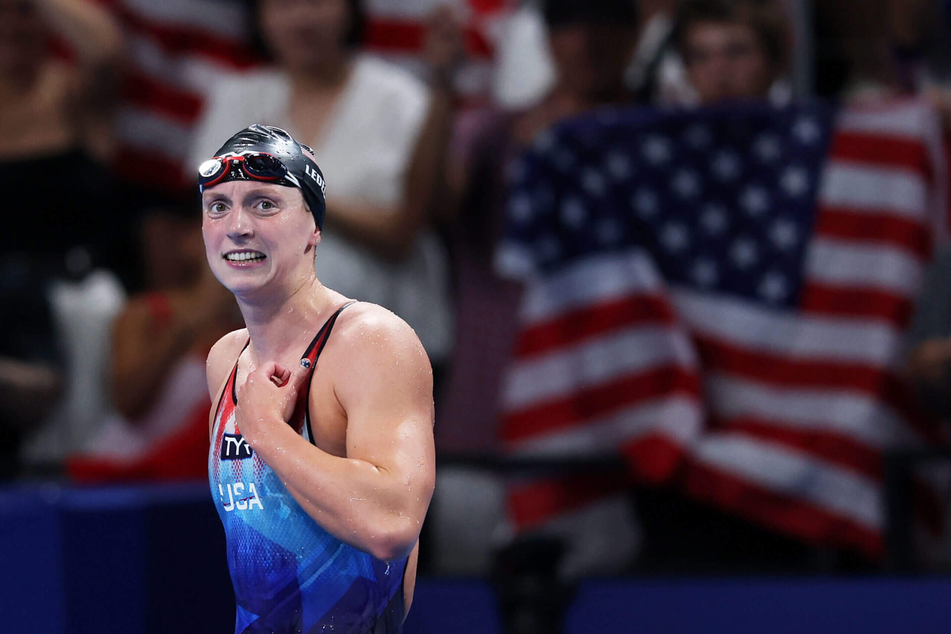 Ledecky sets Olympic record in 1500M freestyle